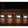 Solar Powered Stainless Steel Fence Lights 4pk 1 Solar Powered Stainless Steel Fence Lights 4pk -EcoPatio Shop 382952 4pk solar powered stainless steel fence wall lights cool white leds 2